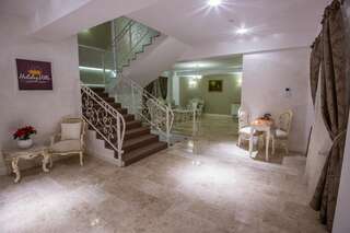 Гостевой дом Pensiunea Holiday Villa Брашов Семейный номер Делюкс-16